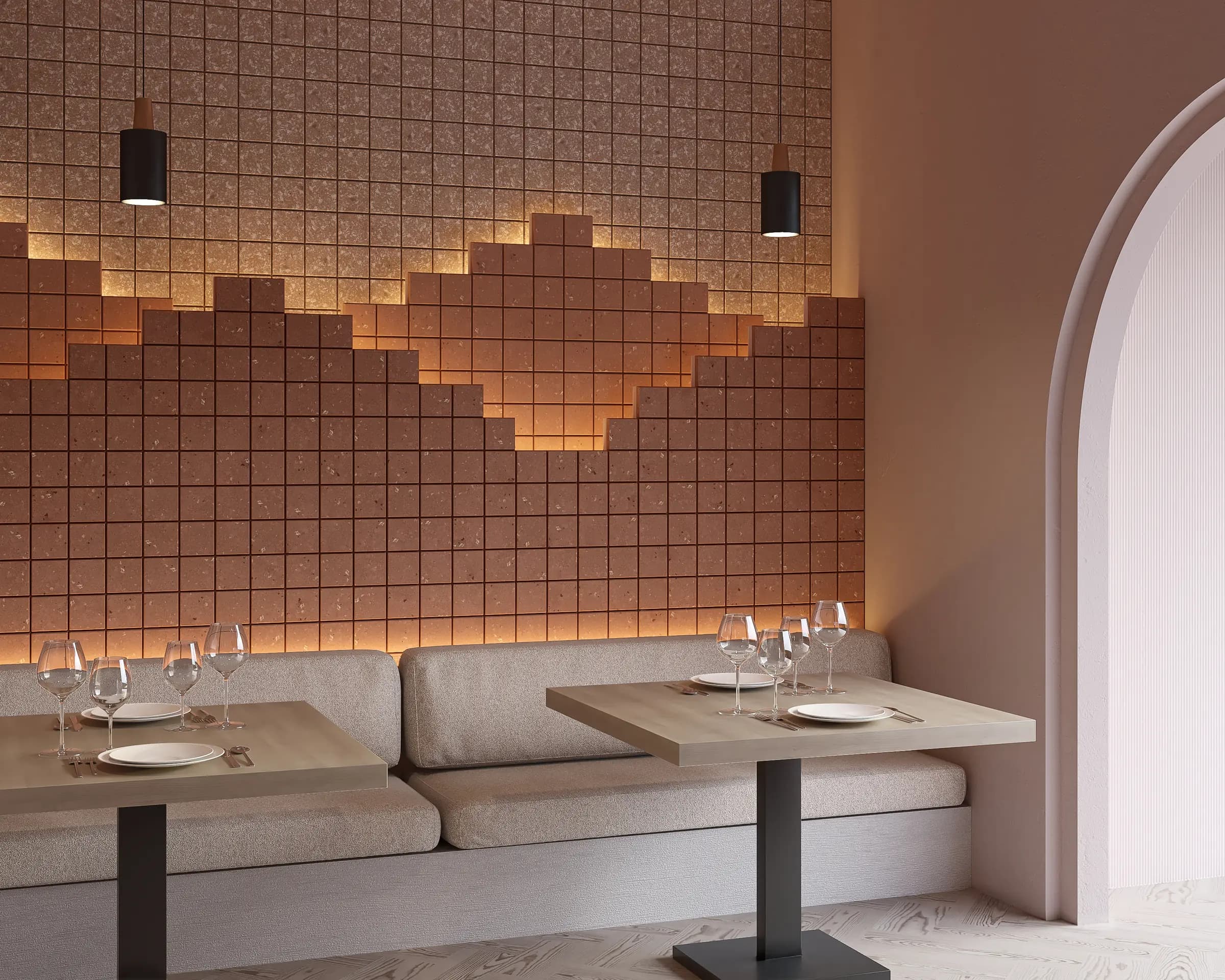 Stepped Manhattan panels lit from behind above a restaurant banquette