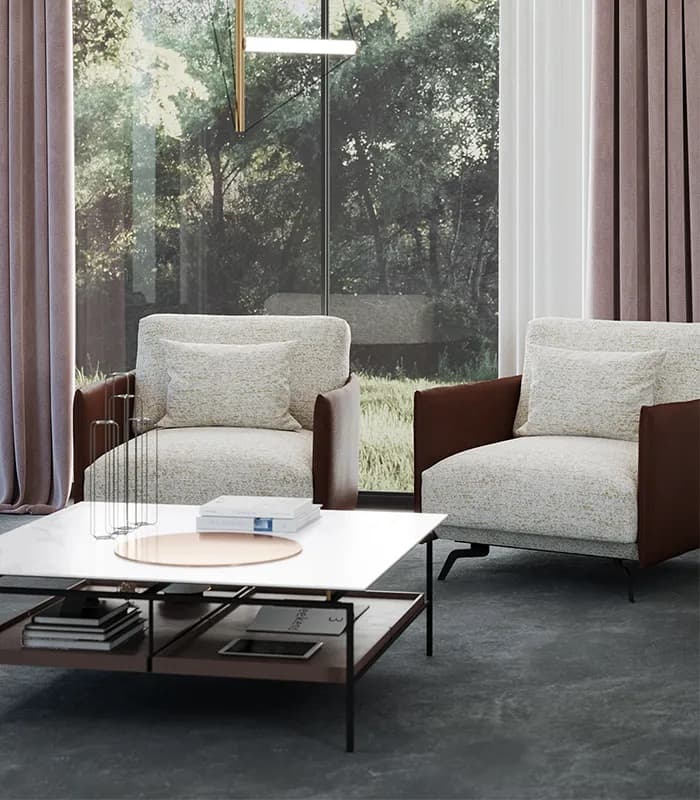 A rust Balma armchair in a bright room