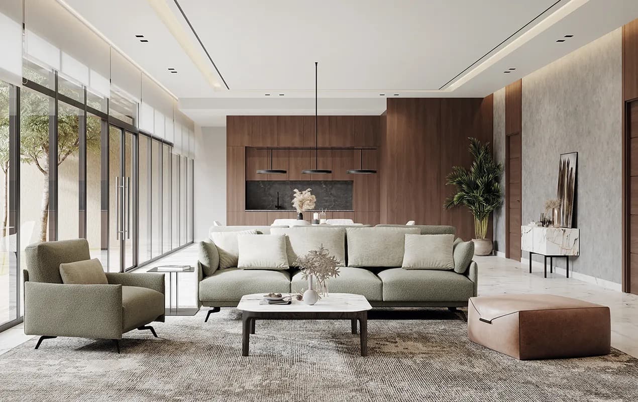 A soft green Balma sofa and chaise longue in a bright living room