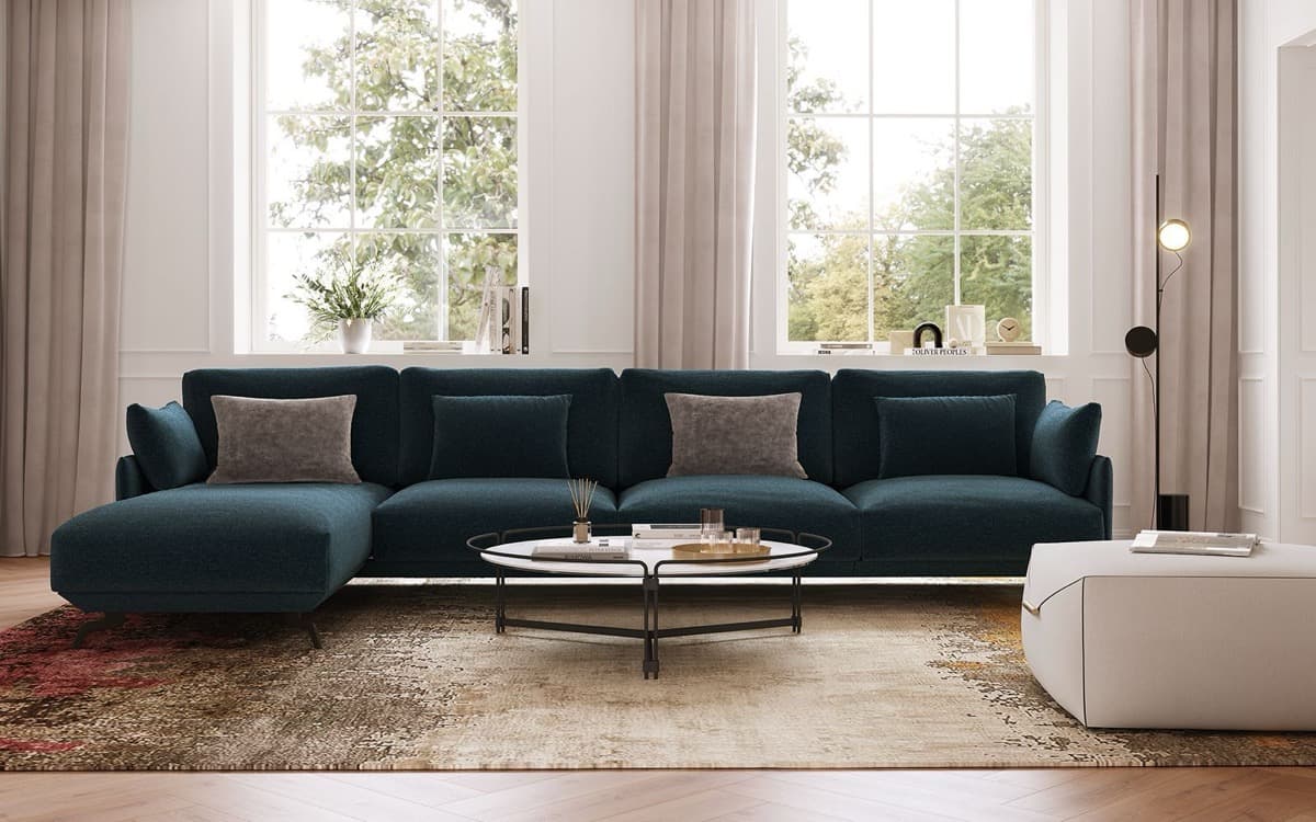 Dressy teal sectional sofa making a bold colour statement in a hotel lobby