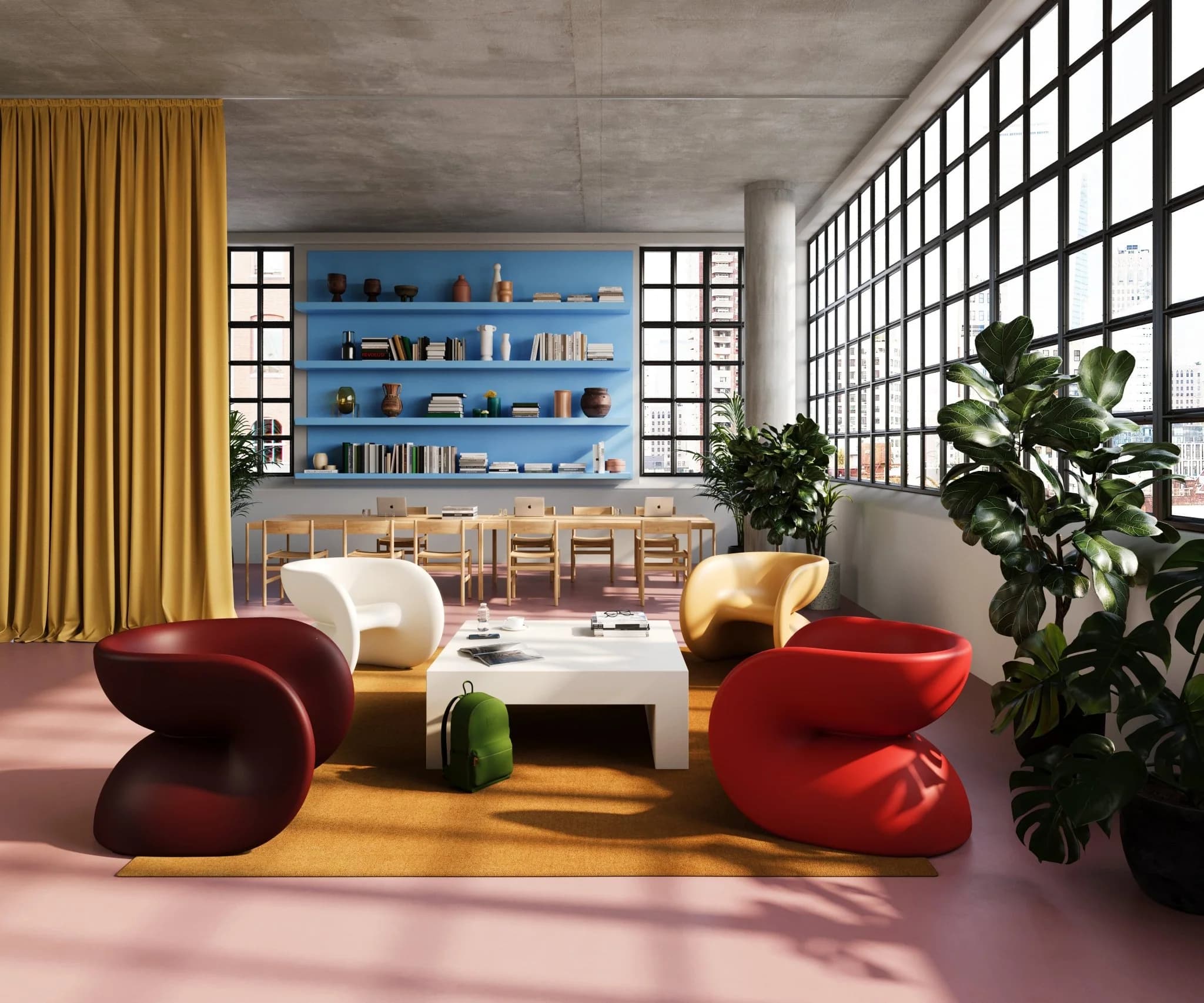 Red Heller Fortune chairs and Bellini seating in a loft with a yellow curtain and a blue bookshelf