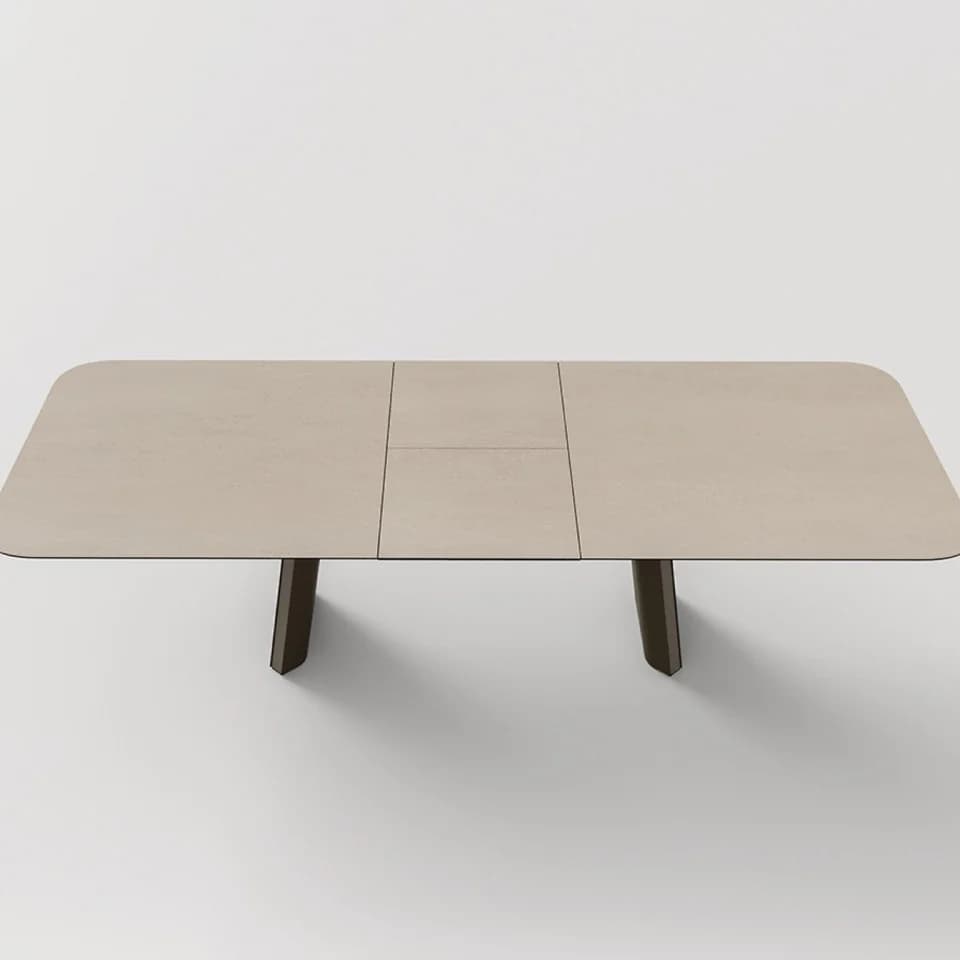 A Plec table seen from above, extended, with its folding centre leaf open between the two ends