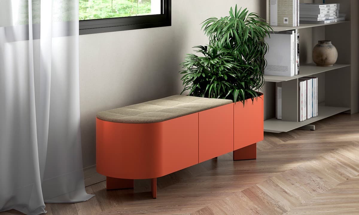 A terracotta Croma planter bench with a timber seat beside shelving