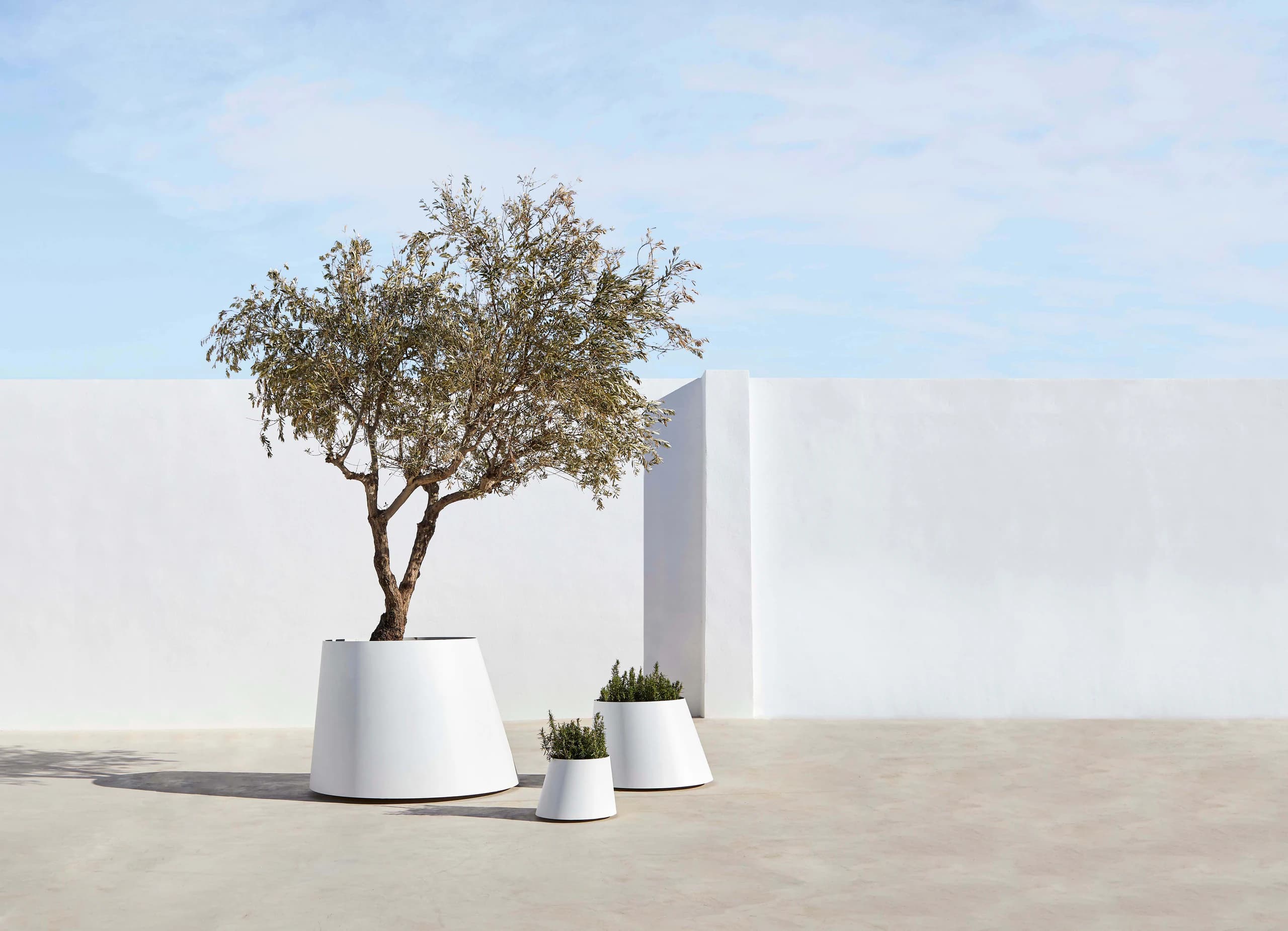 Conee Plant Pot in a furnished setting